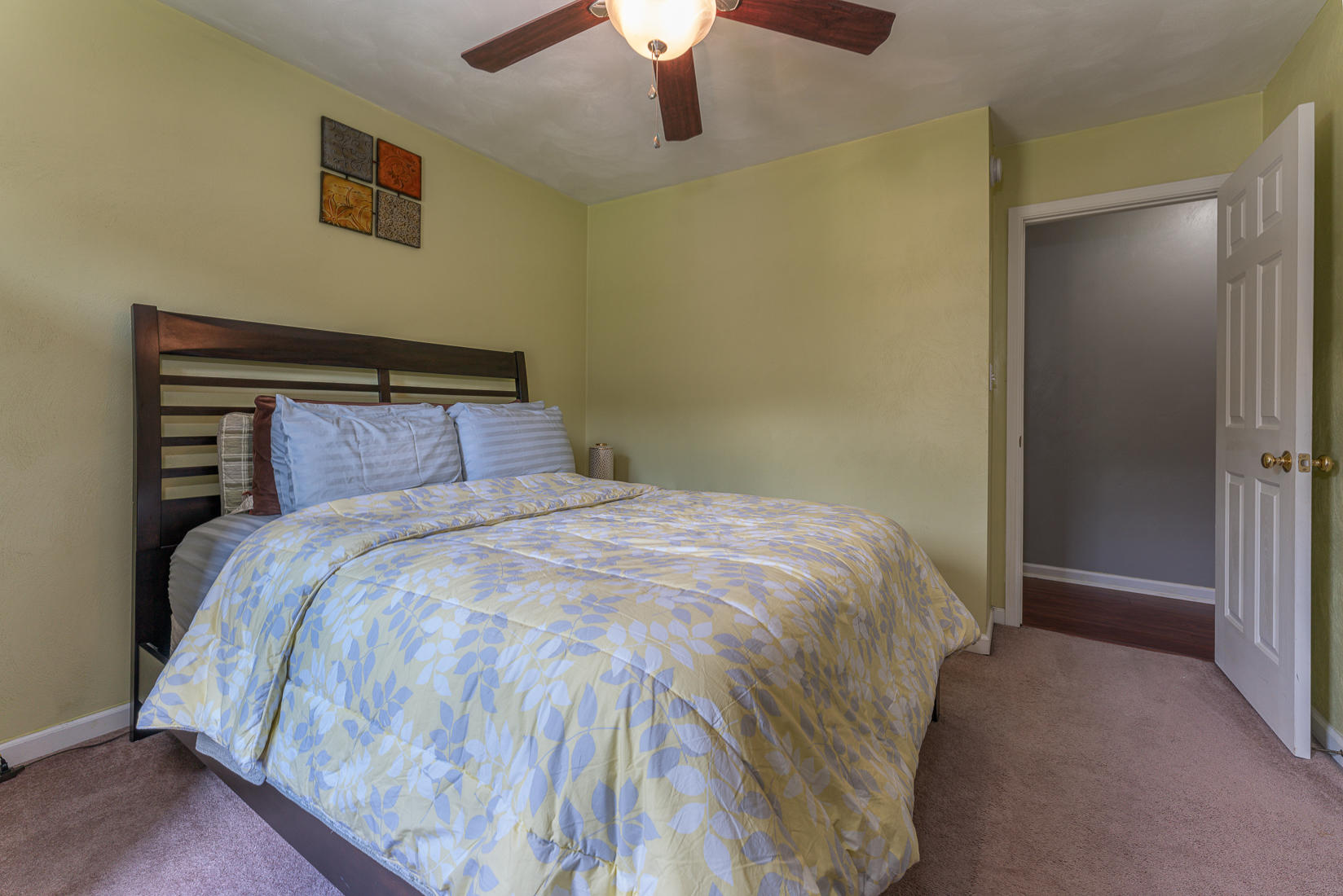 4245 Daugherty Road Salem, VA 24153 - Photo 28 of 44 a bedroom with a bed and a chandelier