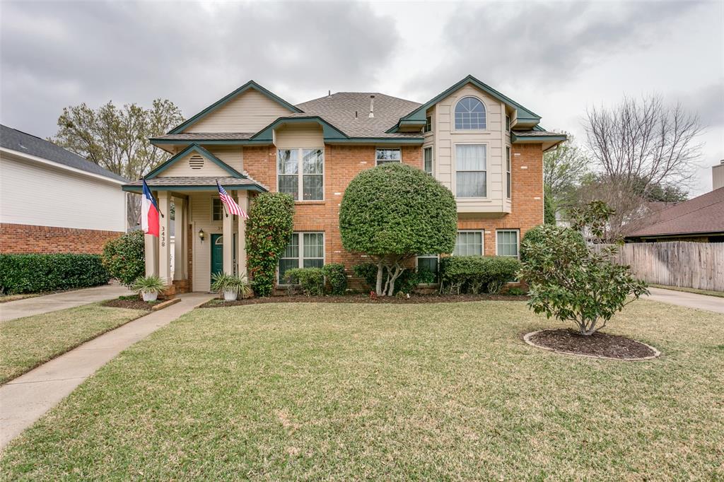 3438 Spring Willow Drive Grapevine, TX 76051 - Photo 1 of 27 a front view of a house with garden
