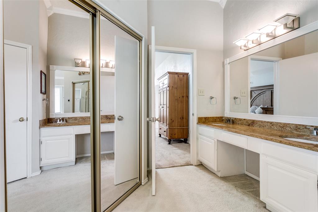 3438 Spring Willow Drive Grapevine, TX 76051 - Photo 12 of 23 Bathroom with double vanity, light carpet, ensuite bath, and ornamental molding