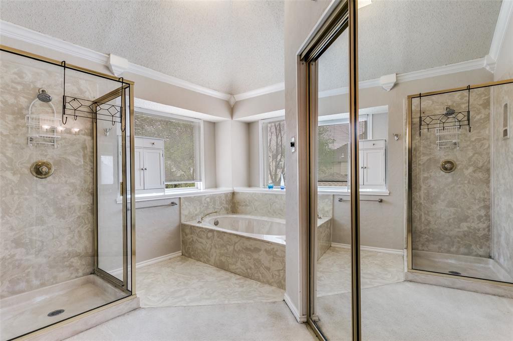 3438 Spring Willow Drive Grapevine, TX 76051 - Photo 15 of 27 a spacious bathroom with a shower and a bathtub
