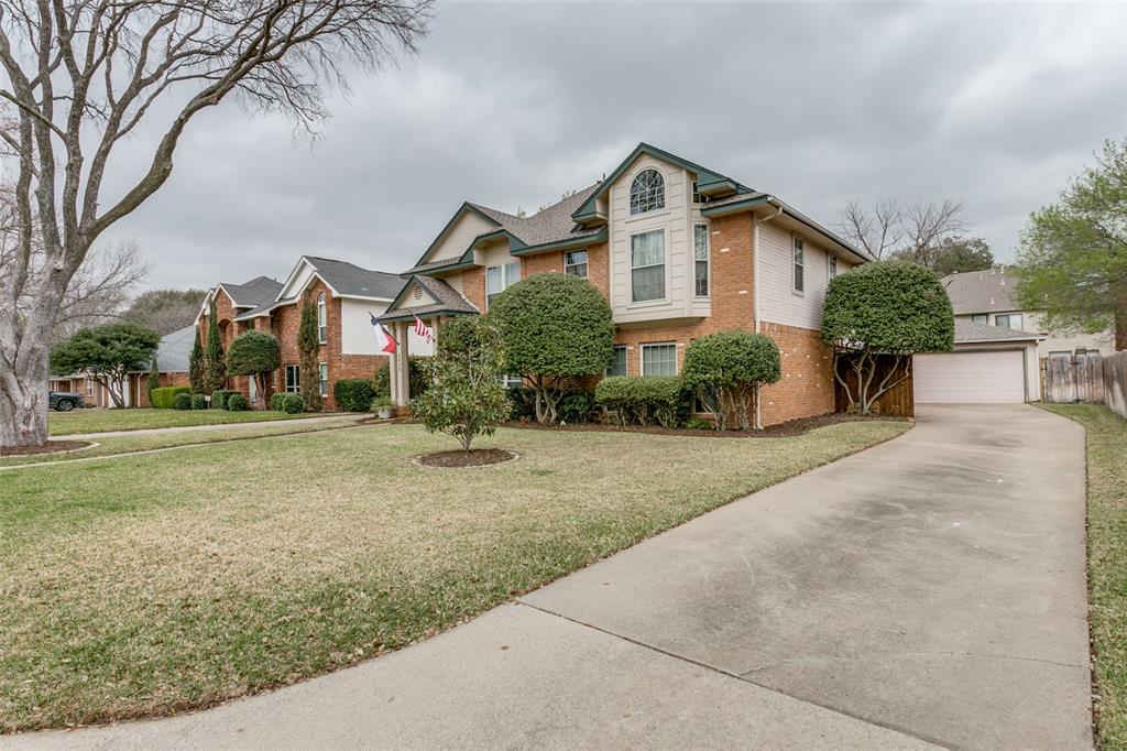 3438 Spring Willow Drive Grapevine, TX 76051 - Photo 2 of 27 a front view of house with yard and green space