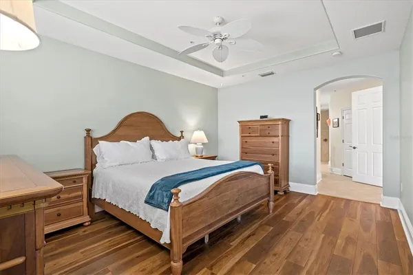 a view of a lake with houses in the back