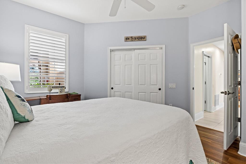 1135 Riverscape Street, Unit 1135 Bradenton, FL 34208 - Photo 35 of 100 a bedroom with a bed and a window