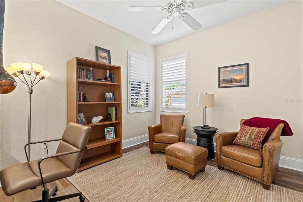 1135 Riverscape Street, Unit 1135 Bradenton, FL 34208 - Photo 38 of 100 a living room with furniture and a window