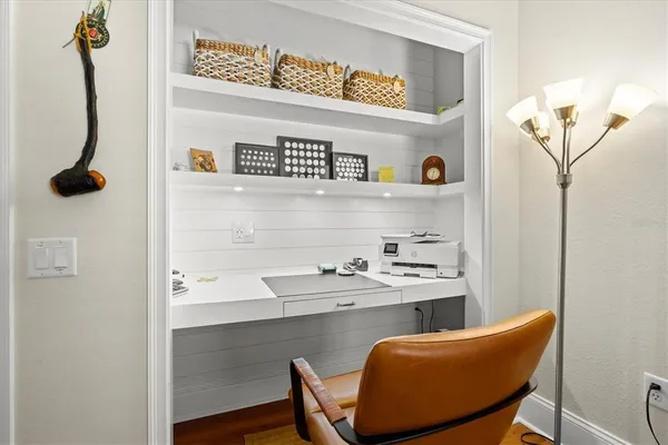 a kitchen with stainless steel appliances granite countertop a sink stove and microwave