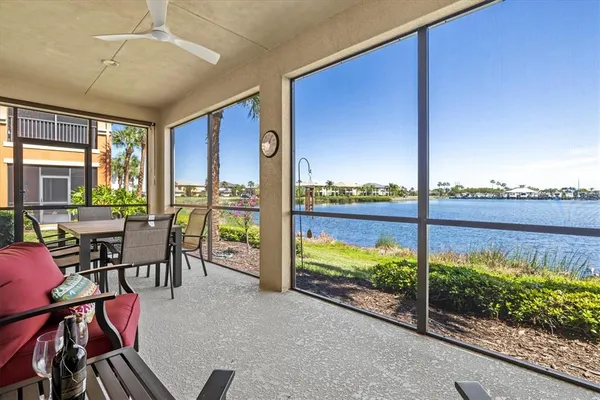 a view of a swimming pool with an outdoor seating