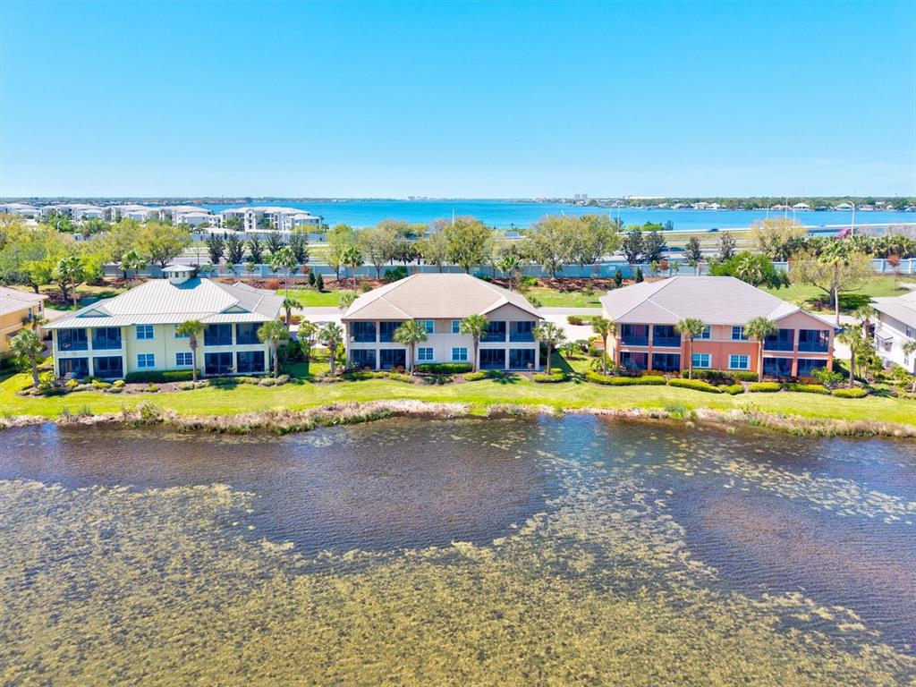 1135 Riverscape Street, Unit 1135 Bradenton, FL 34208 - Photo 59 of 100 a aerial view of a house with swimming pool