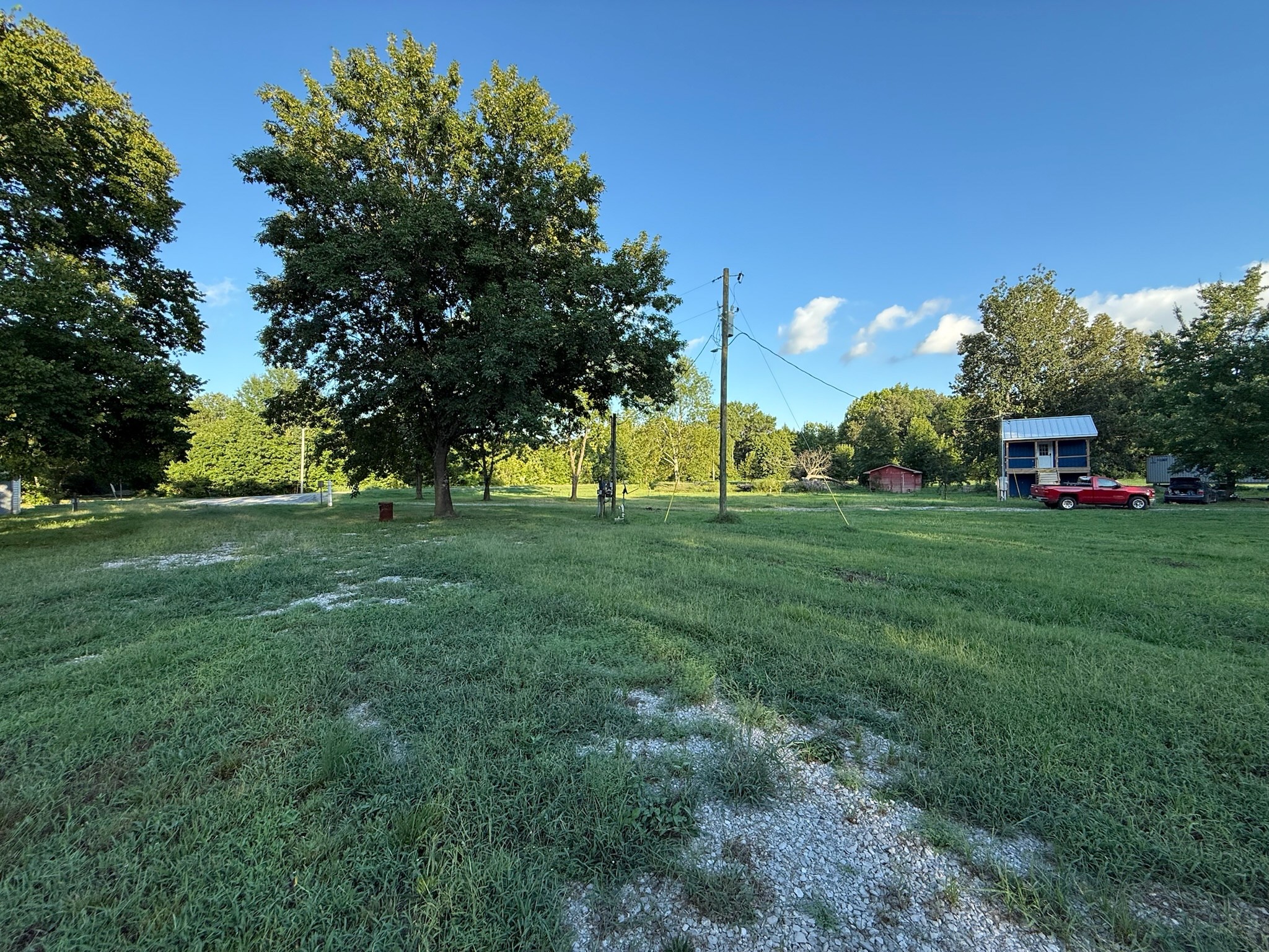 17541 Rangers Landing Road Calhoun, KY 42327 - Photo 27 of 38 a view of grassy field with benches