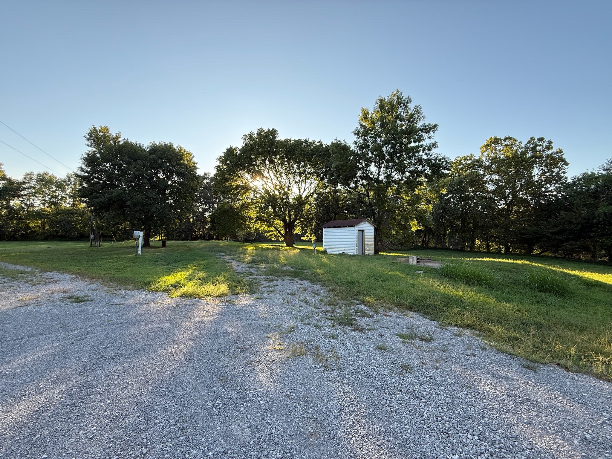 17541 Rangers Landing Road Calhoun, KY 42327 - Photo 34 of 38 a view of a house with a yard
