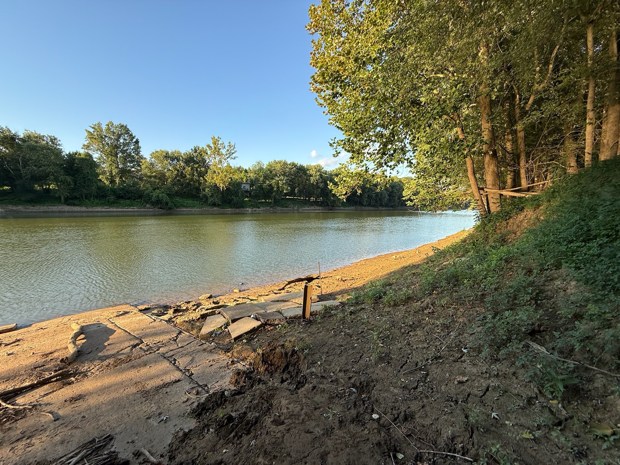 17541 Rangers Landing Road Calhoun, KY 42327 - Photo 36 of 38 a view of a lake with houses in the back