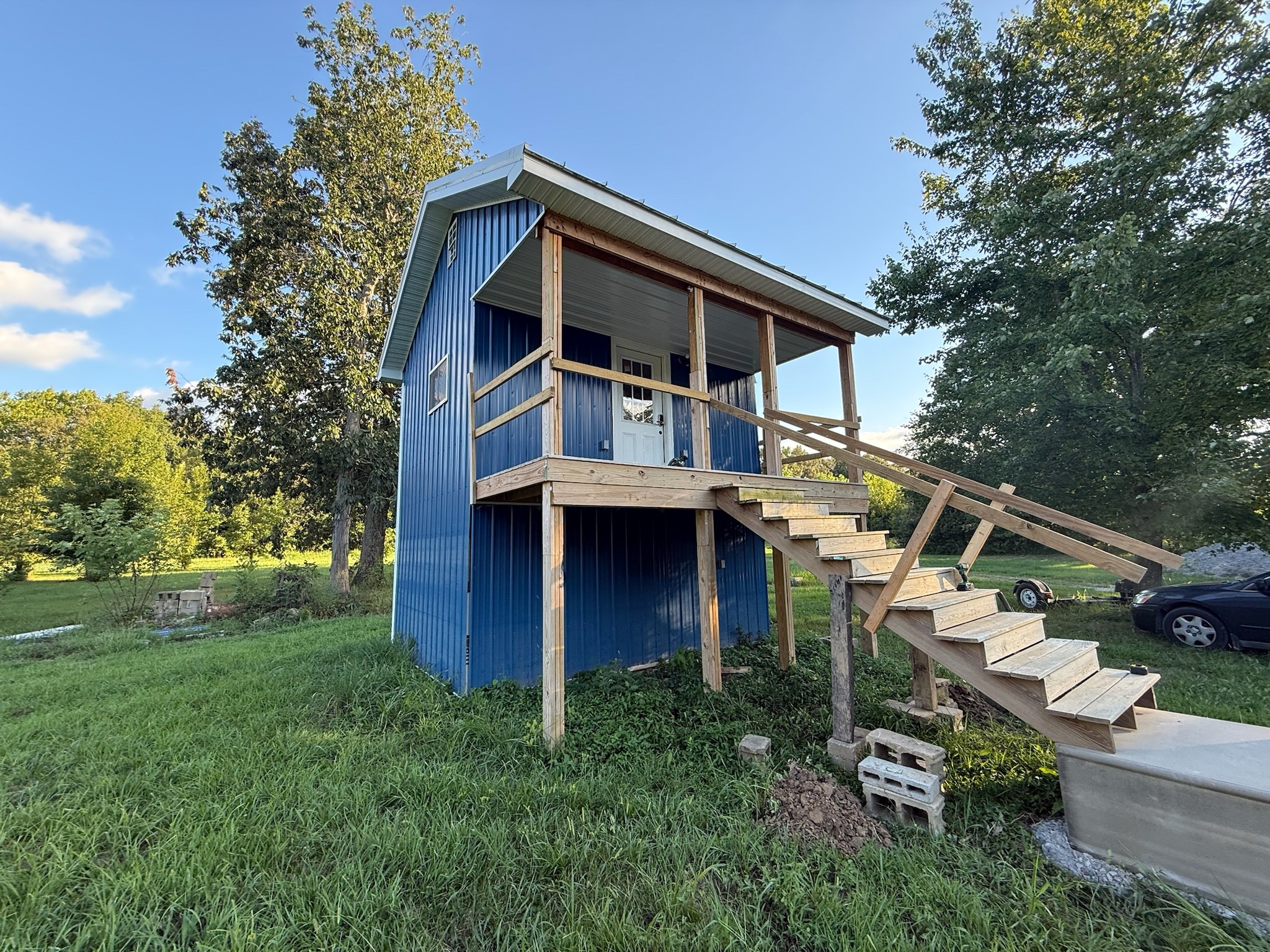 17541 Rangers Landing Road Calhoun, KY 42327 - Photo 6 of 38 a front view of a house with garden