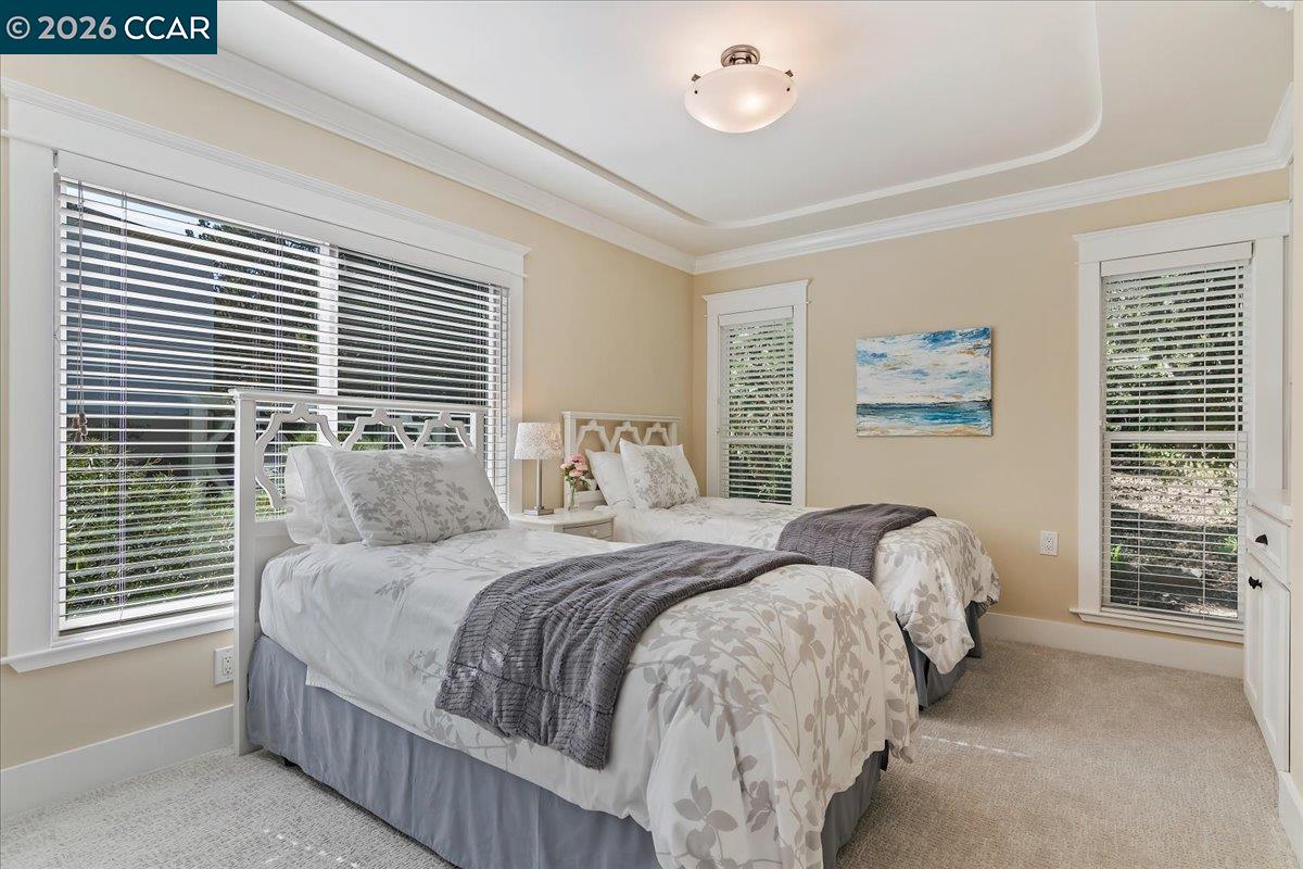 1332 Running Springs Road, Unit 1 Walnut Creek, CA 94595 - Photo 18 of 26 a bedroom with a large bed and a window