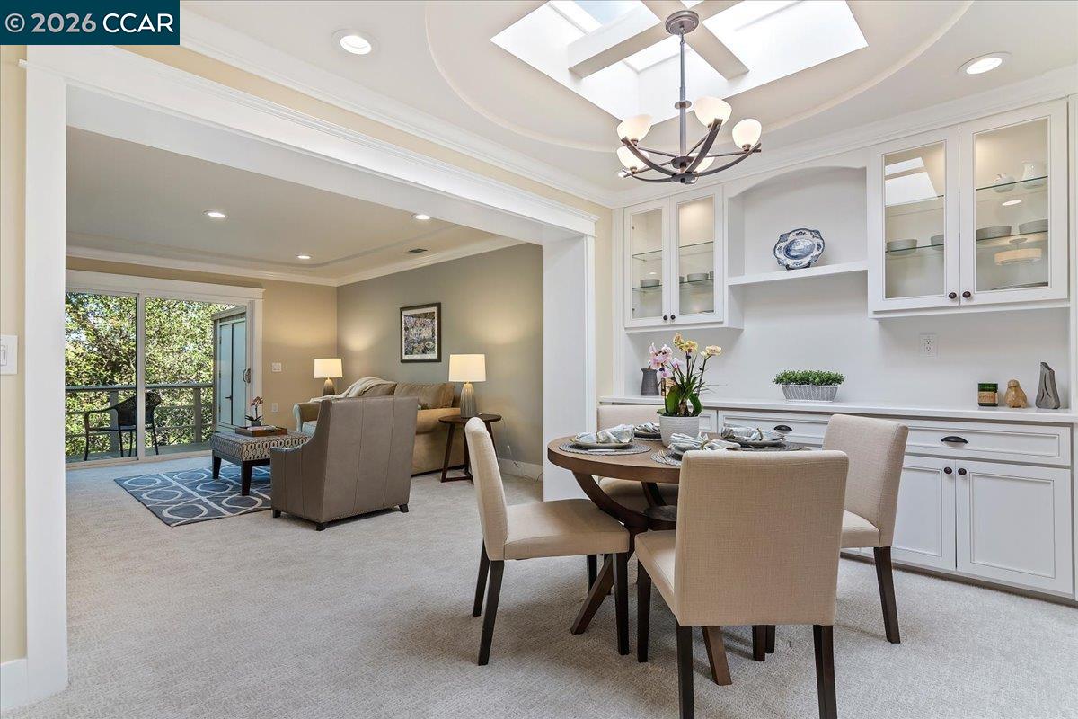 1332 Running Springs Road, Unit 1 Walnut Creek, CA 94595 - Photo 6 of 26 a view of a dining room with furniture window and outside view