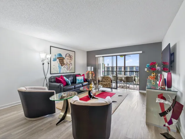 a living room with a couch and a flat screen tv