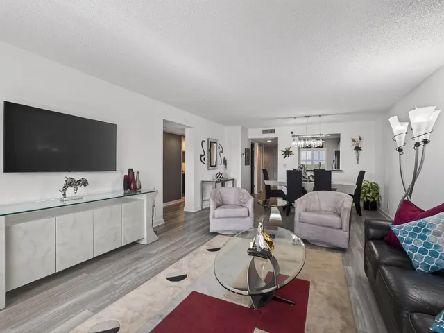 a living room filled with furniture and a couch