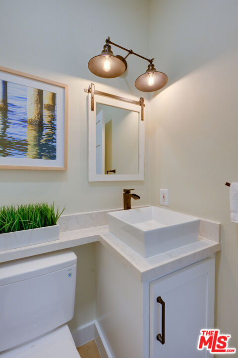 1 Spinnaker Street, Unit 11 Marina del Rey, CA 90292 - Photo 19 of 35 a bathroom with a sink and a mirror