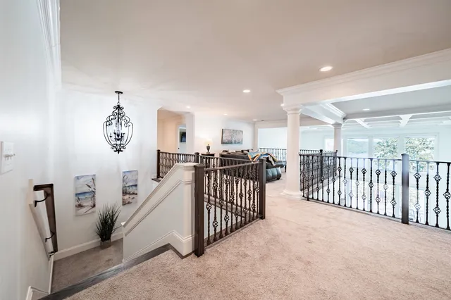 a view of a hallway with windows