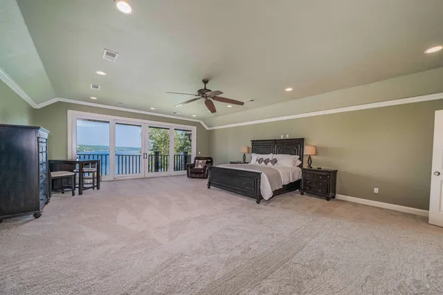 a big room with furniture and a large window