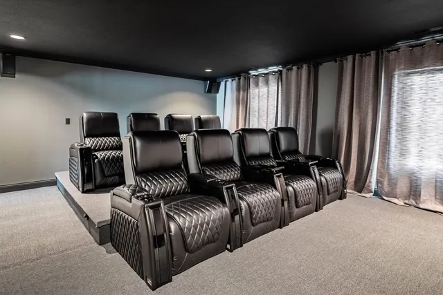 a bedroom with a bed couch and window