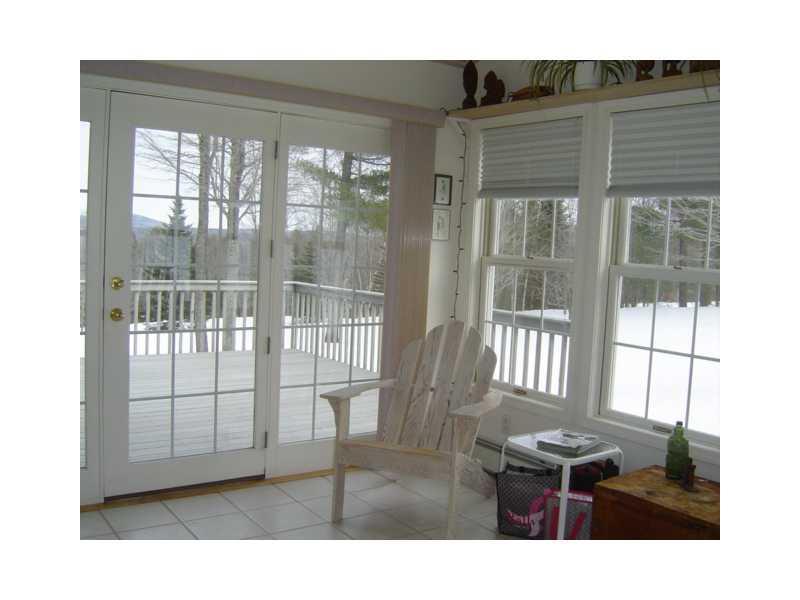 88 Parsons Road Norway, ME 04268 - Photo 12 of 35 Sunroom. Even in the winter the sun...