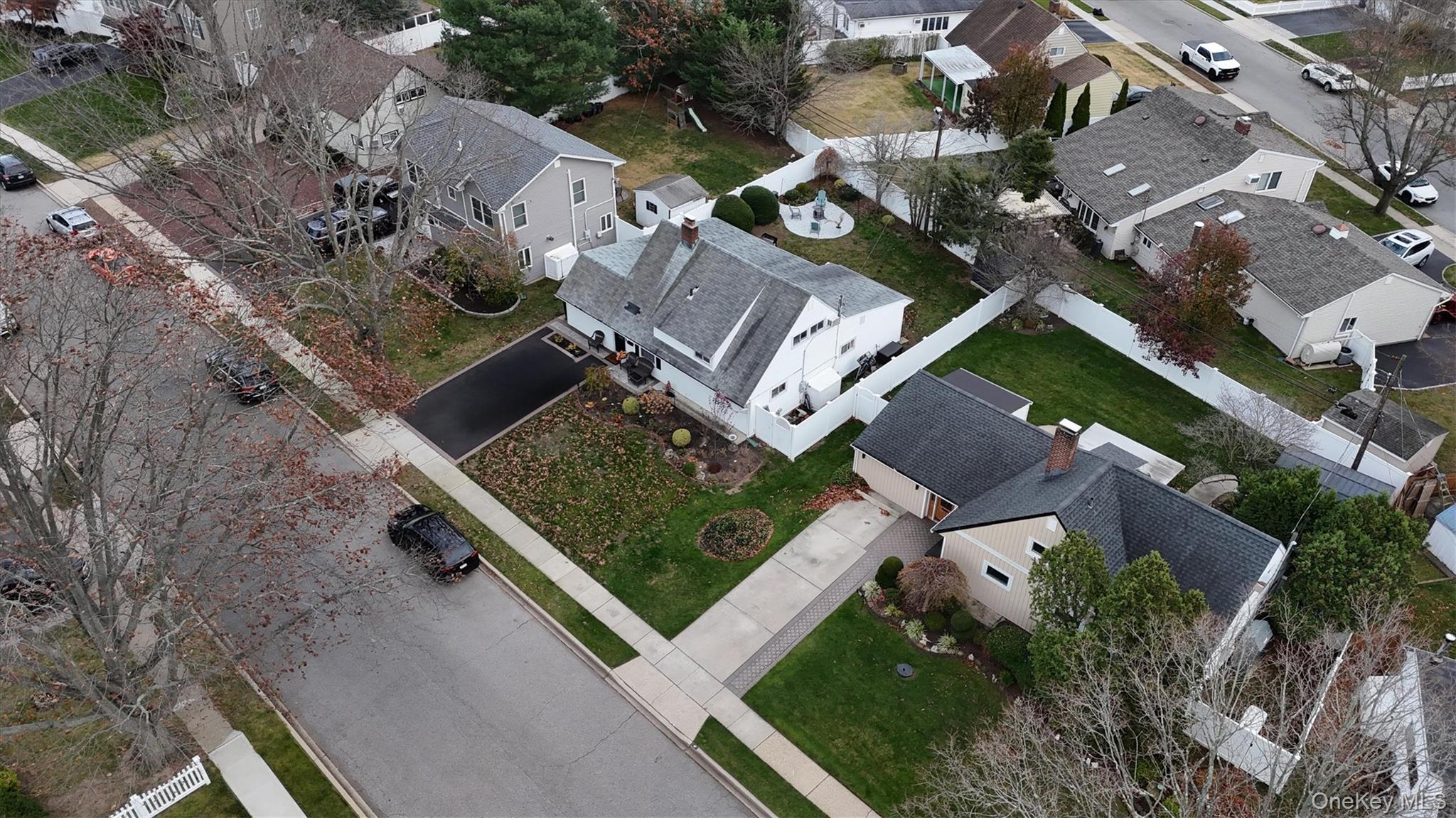 43 Ribbon Lane Wantagh, NY 11793 - Photo 31 of 36 Aerial overview of property's location featuring nearby suburban area