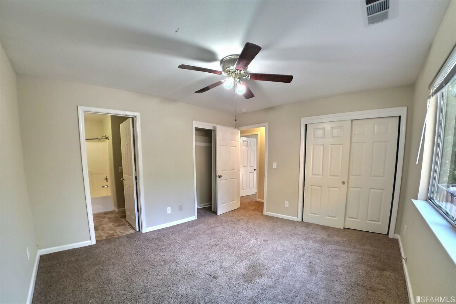 241 Ealey Road Glencoe, CA 95232 - Photo 34 of 43 a view of a livingroom with a ceiling fan and window