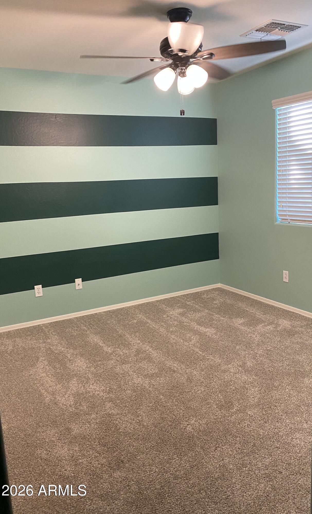 10225 West Camelback Road, Unit 19 Phoenix, AZ 85037 - Photo 23 of 51 a view of an empty room
