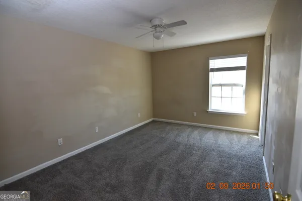 a bathroom with a sink a toilet and bathtub