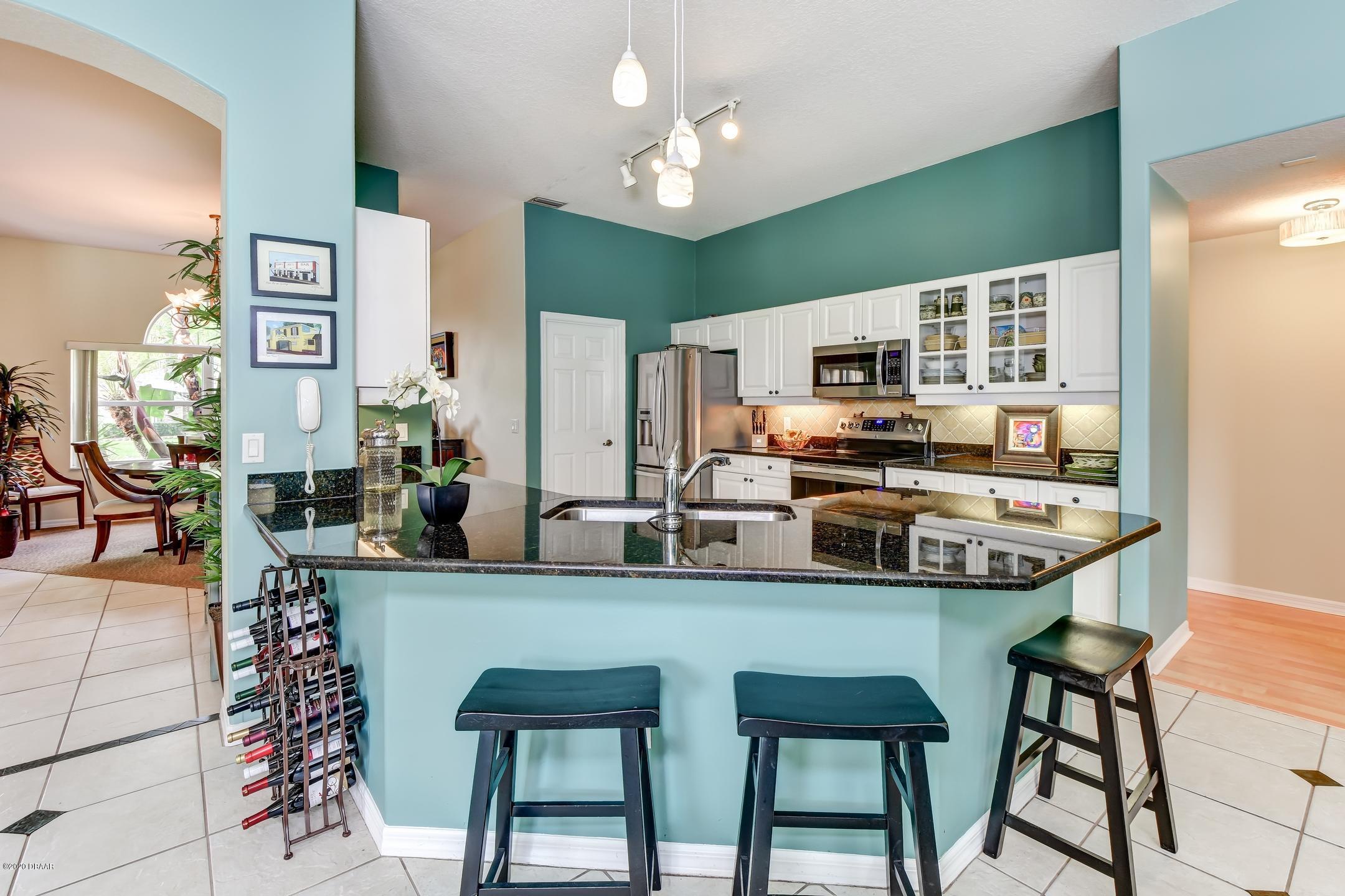 998 Grassy Ridge Port Orange, FL 32127 - Photo 12 of 55 10-Kitchen