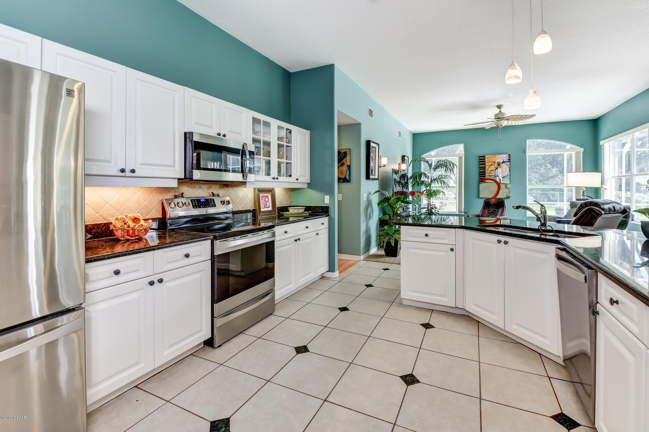 998 Grassy Ridge Port Orange, FL 32127 - Photo 15 of 55 13-Kitchen