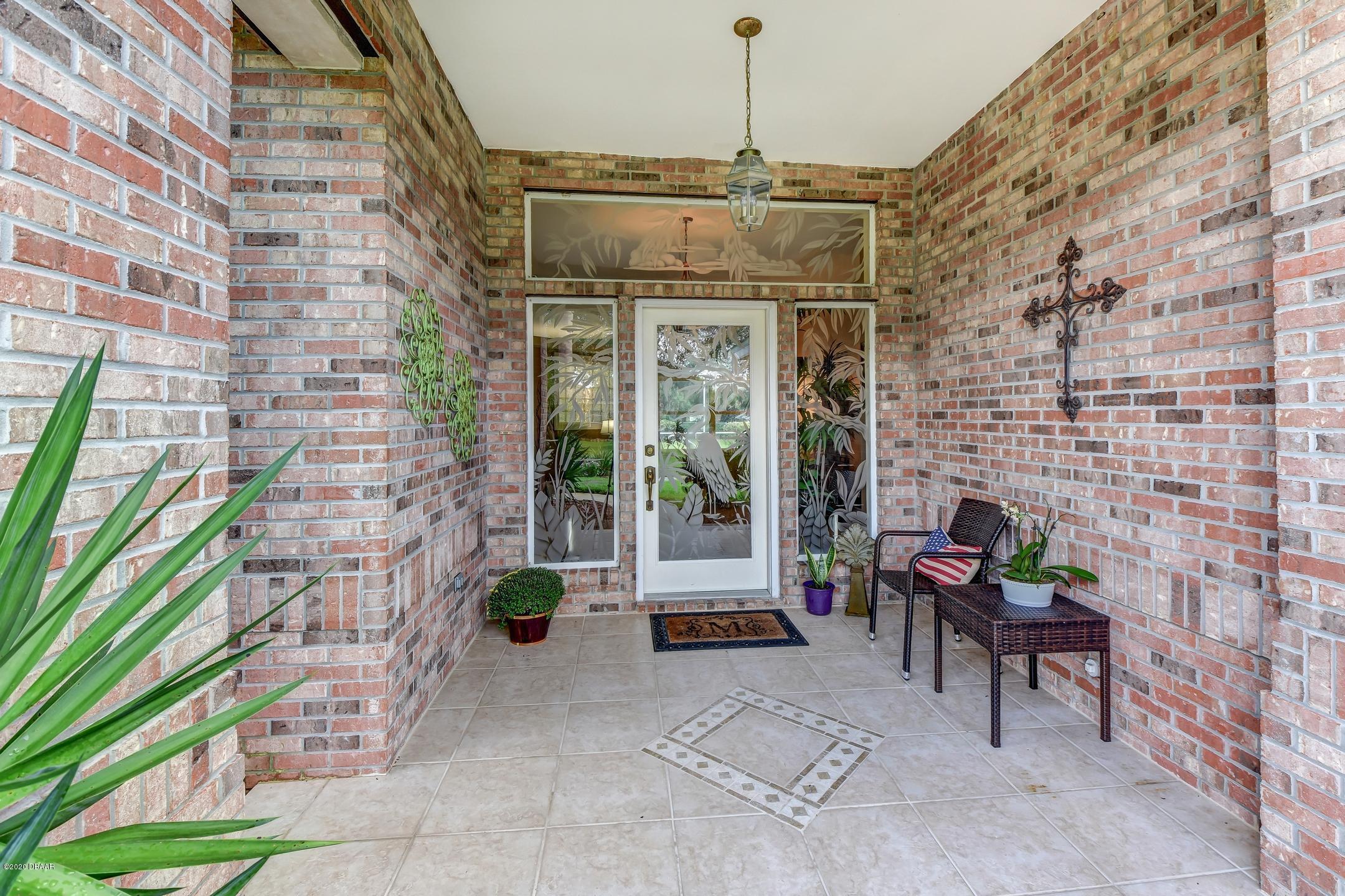 998 Grassy Ridge Port Orange, FL 32127 - Photo 3 of 55 50-Front Entry