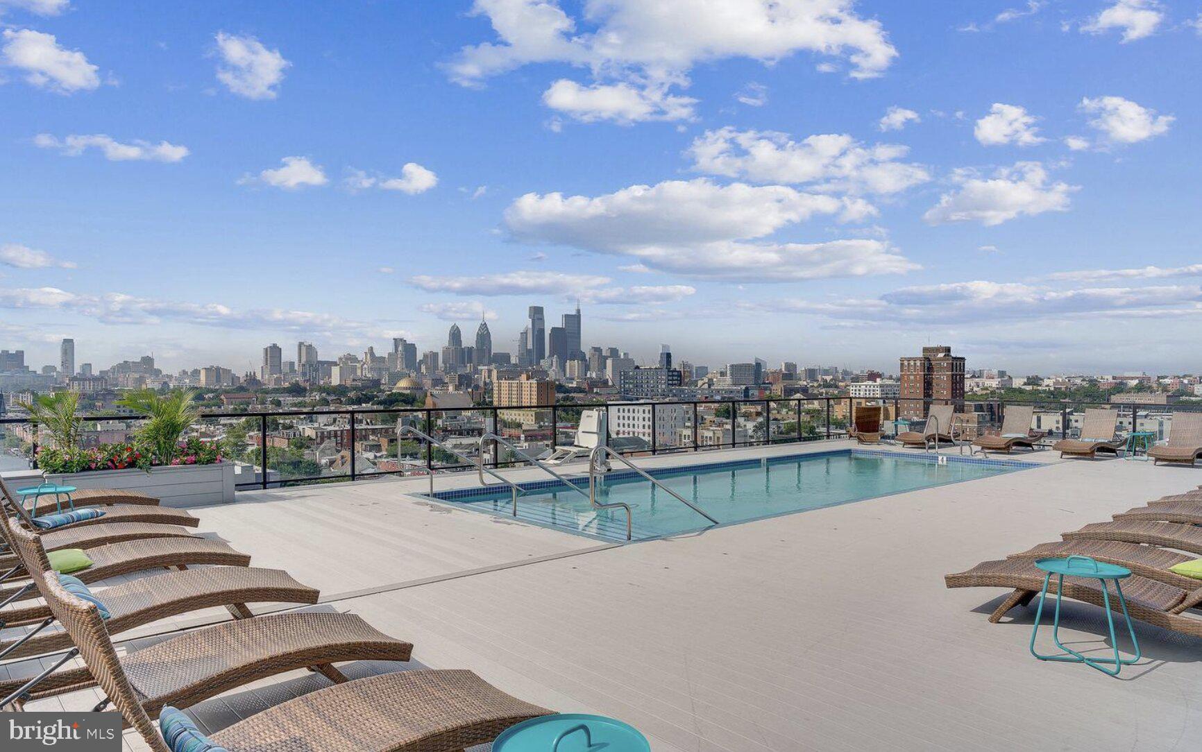 1401-25 North 5th Street, Unit 401 Philadelphia, PA 19122 - Photo 1 of 14 a view of a terrace with sitting area