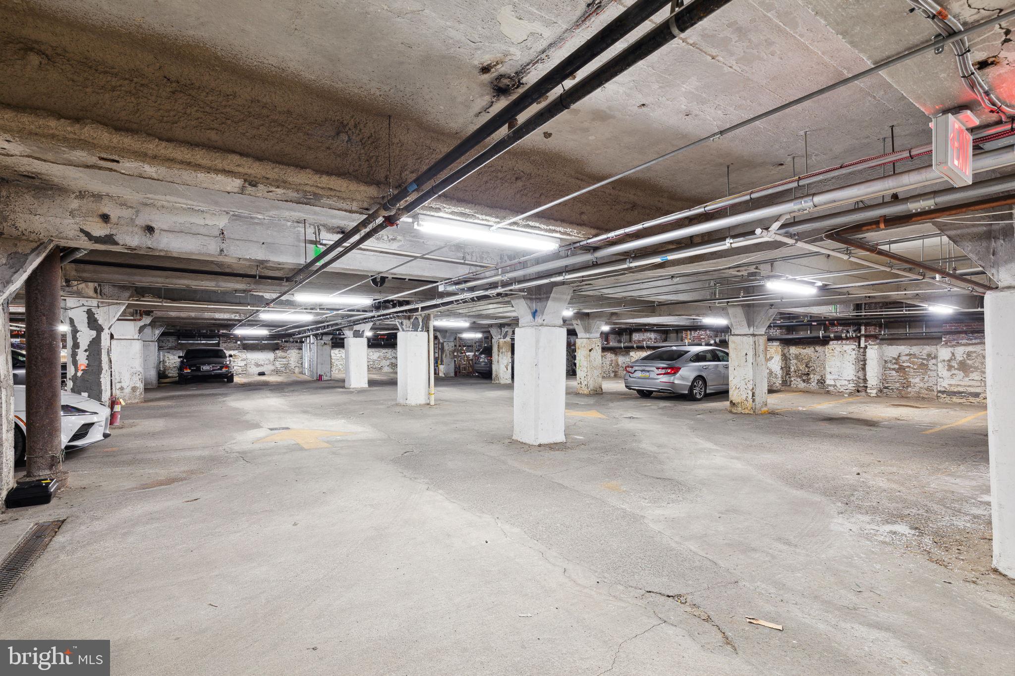 1401-25 North 5th Street, Unit 401 Philadelphia, PA 19122 - Photo 11 of 14 a view of parking garage with cars