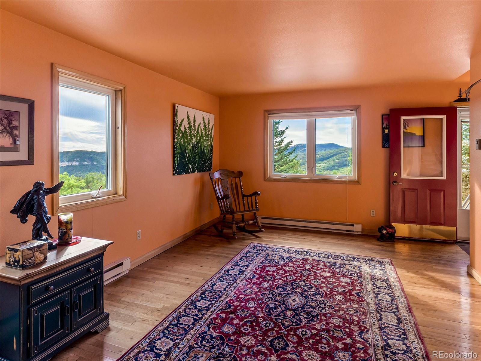 40705 Hill N Dale Road Steamboat Springs, CO 80487 - Photo 21 of 37 a living room with furniture and a window