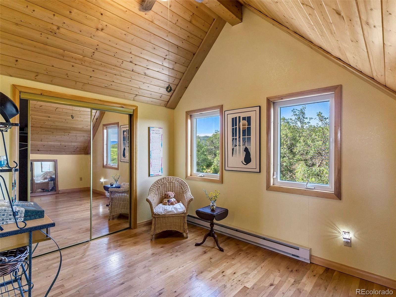 40705 Hill N Dale Road Steamboat Springs, CO 80487 - Photo 27 of 37 a living room with furniture and a window