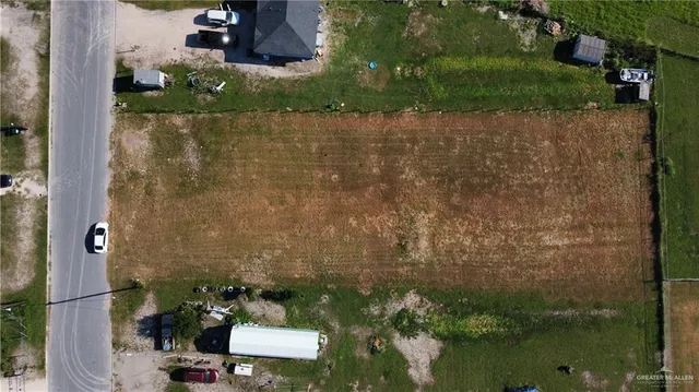 an aerial view of residential house with outdoor space