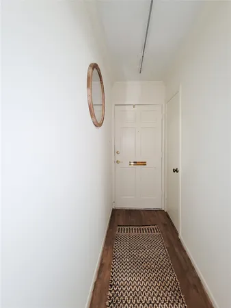 a bedroom with a bed and a ceiling fan