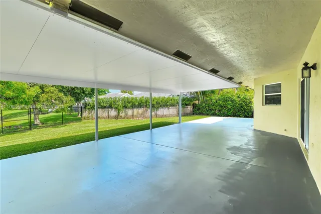 a view of a garden with an outdoor space