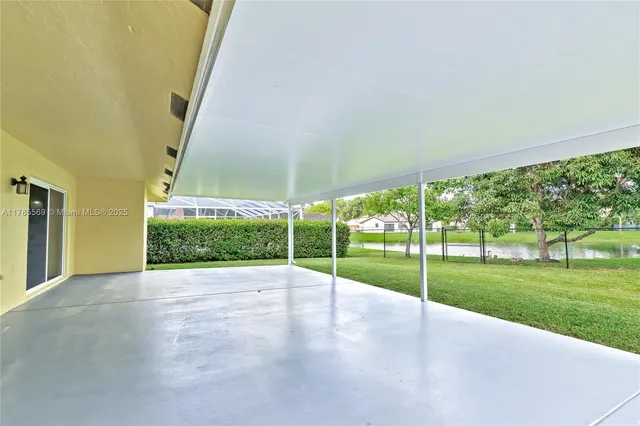 a view of a garden with an outdoor space