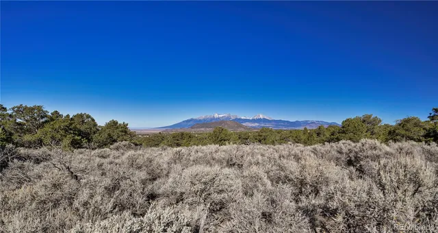 a view of mountain and sunset