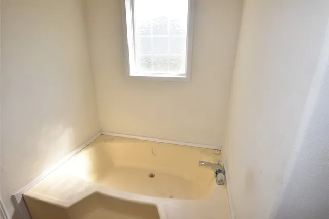 a bathroom with a bathtub
