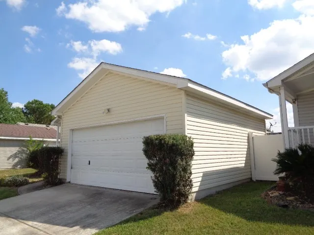 a view of a back yard of the house