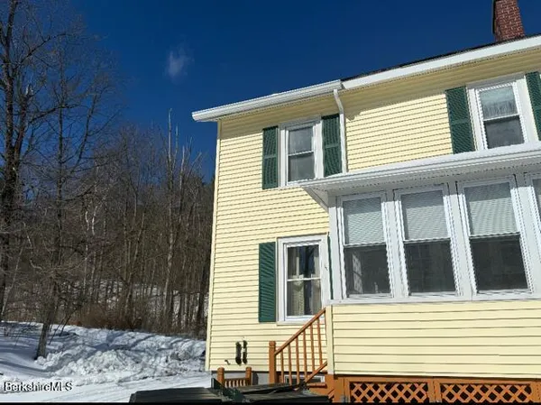 a view of a house with a balcony