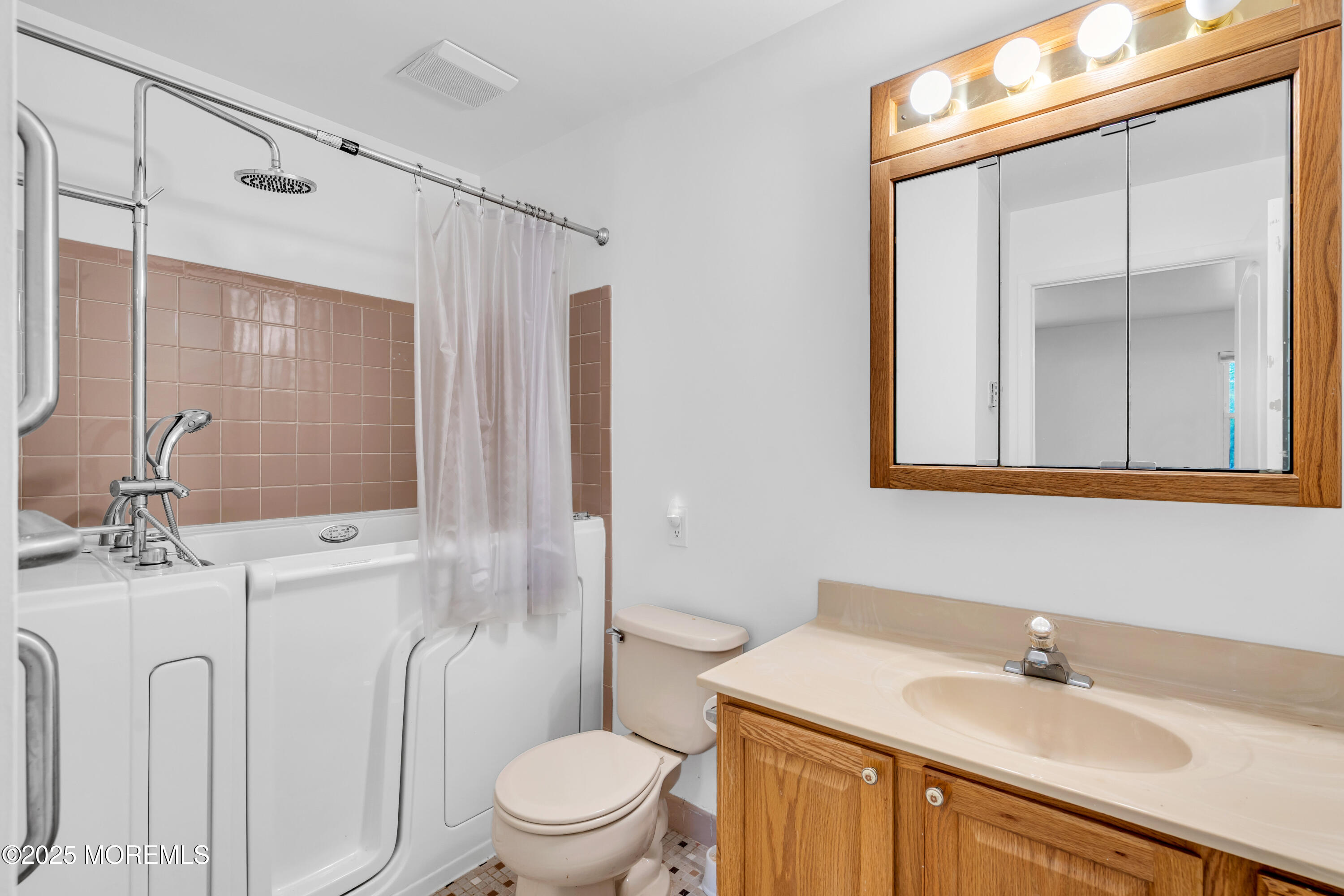 26 Columbus Boulevard, Unit A Whiting, NJ 08759 - Photo 15 of 23 a bathroom with a sink toilet and shower