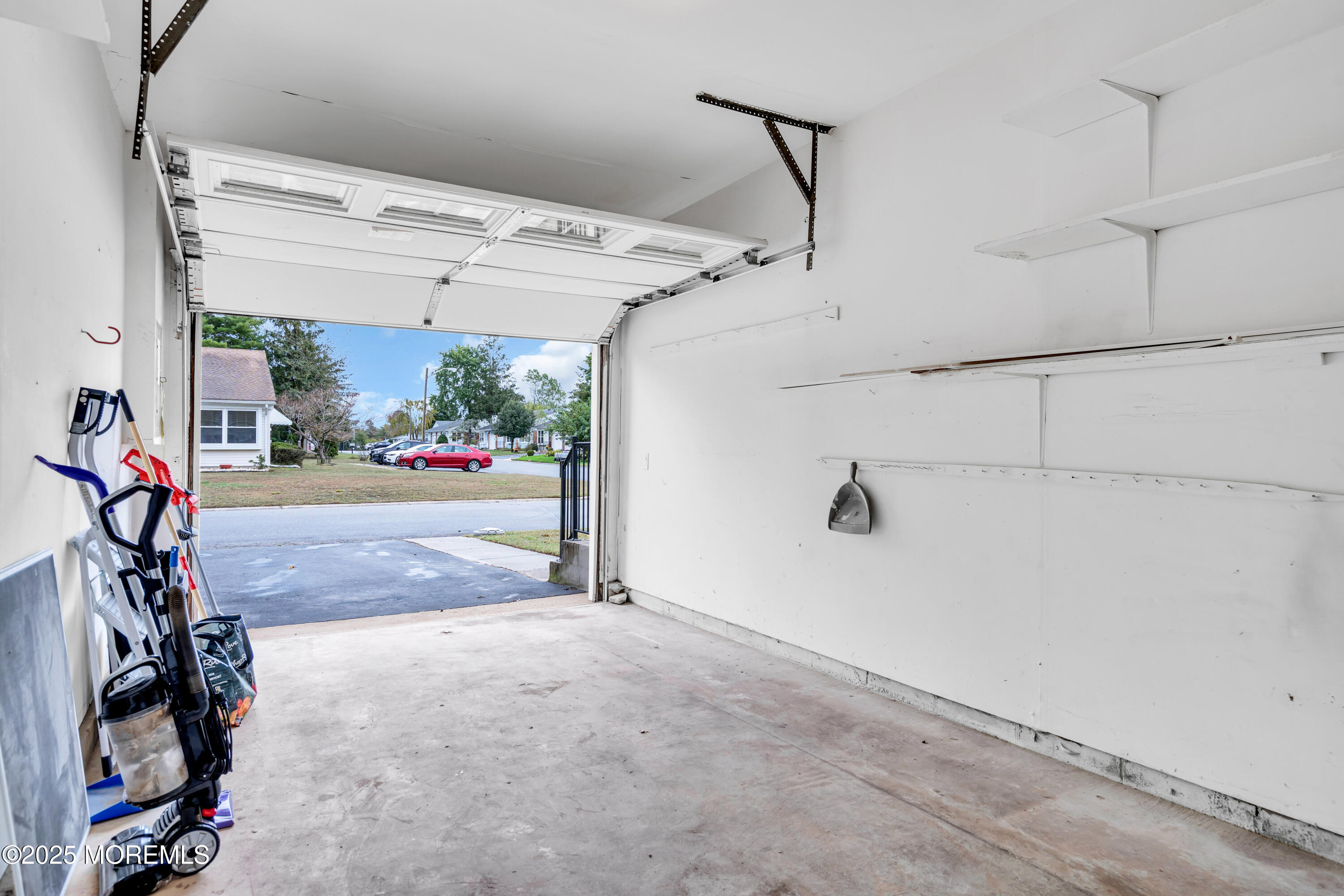 26 Columbus Boulevard, Unit A Whiting, NJ 08759 - Photo 20 of 23 a view of a garage with storage