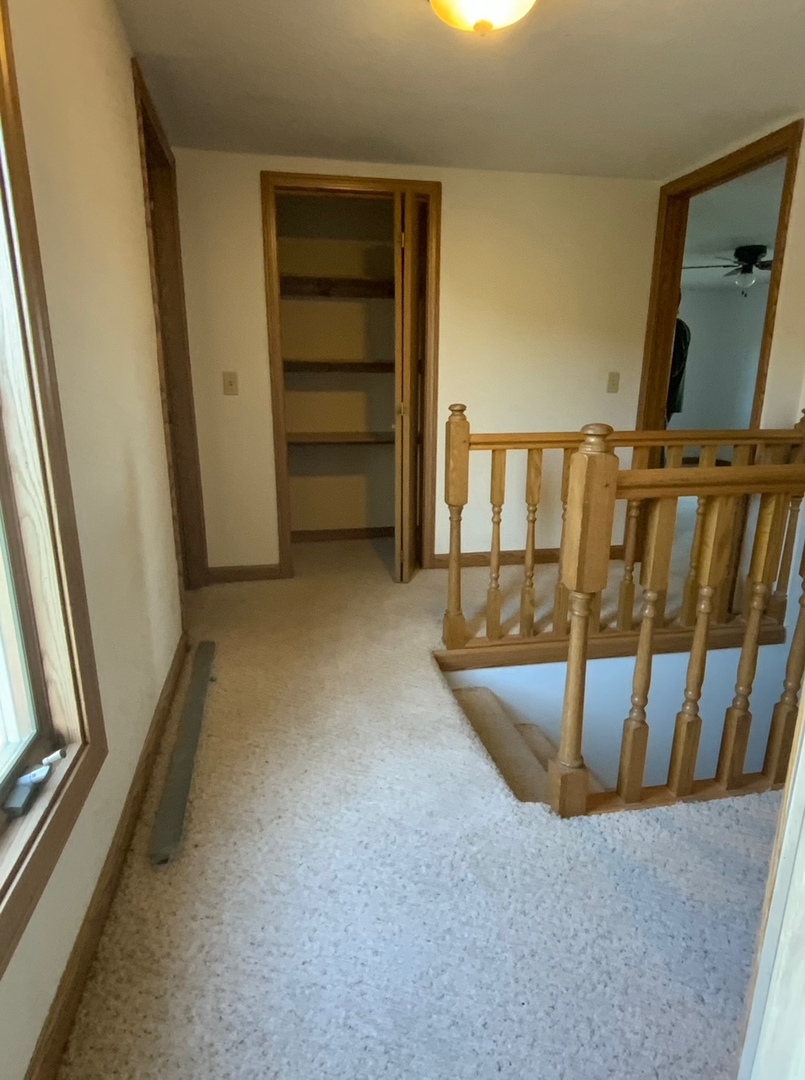 382 Keigwin Road Walnut, IL 61376 - Photo 42 of 49 a view of a living room with stairs