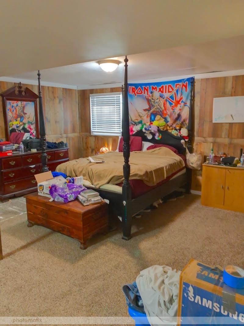 485 Powder House Road Powell, TN 37849 - Photo 12 of 24 a bedroom with a bed and a couch
