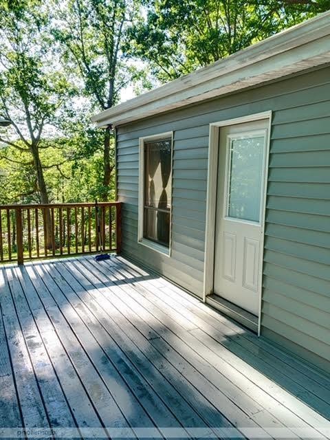 485 Powder House Road Powell, TN 37849 - Photo 17 of 24 a view of backyard with a deck