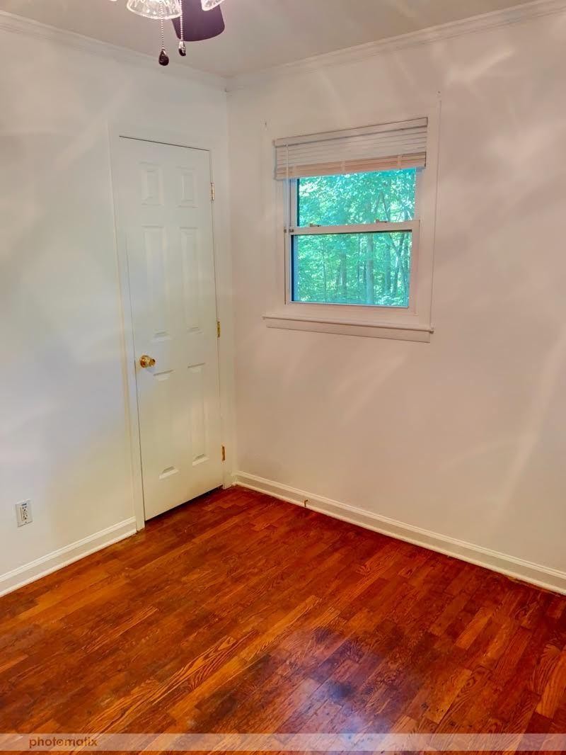 485 Powder House Road Powell, TN 37849 - Photo 8 of 24 an empty room with a window