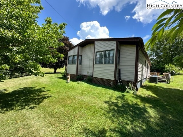 32 Stoneacres Lane Independence, VA 24348 - Photo 13 of 27 a view of a house with a yard